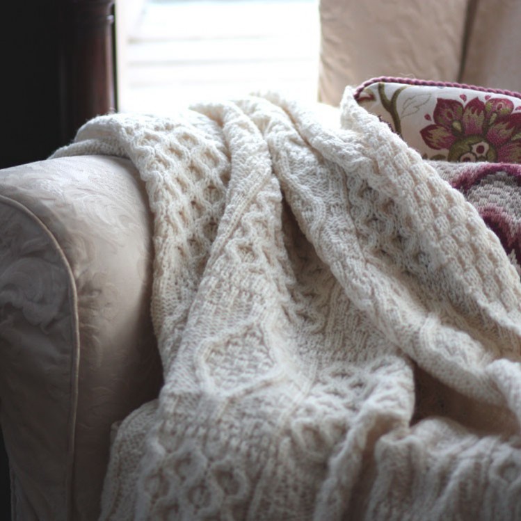 Copy Miranda's style with this Chunky knit Aran throw by the Wool company. Sex and the city set design interior inspiration.