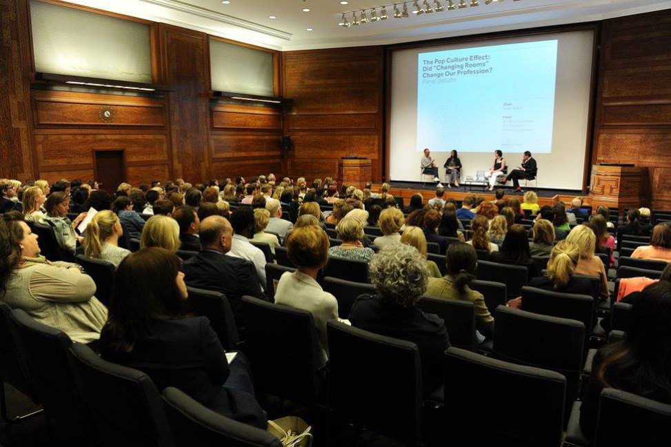 The BIID Annual Conference, AGM and Summer Party 2015. Audience watching the Interior designers in popular culture section from panel members: Tom Dyckhoff, Michelle Ogundehin and Ann Booth-Clibborn on stage with BIID chair Aidan Walker at this year's BIID annual conference.