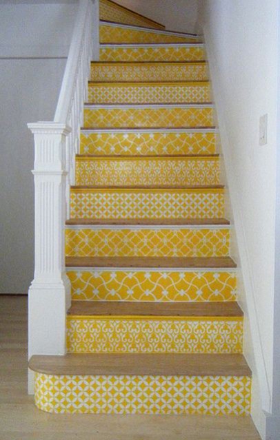 Hallway flooring ideas. THE STYLE FILES (2011) Create a stenciled stair risers by using a combination of different stencils but use the same colour, or save off cuts of wallpaper and mix colours and patterns to create an eye catching staircase.