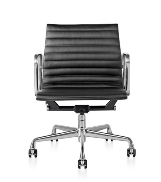 Interior Design Set Design. Mad Men. Don Draper's iconic Eames Aluminum Group Management Chair in black leather by Herman Miller. 