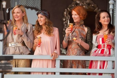 The SATC ladies enjoying the views from their glamorous Moroccan hotel balcony. Sex and the city 2 set design inspired interior design ideas.