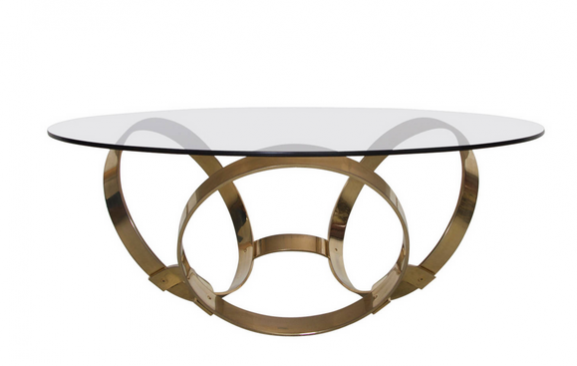 Sex and the City set design inspired interior design: Round Brass Geometric Rings Coffee Table with Glass Top