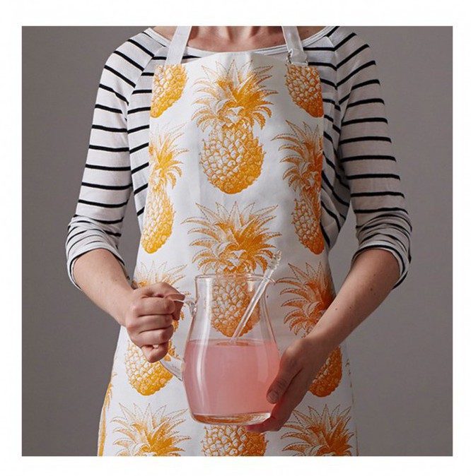 How to incorporate the Tropical Trend into your interior. Pineapple print apron from Thornback & Peel.
