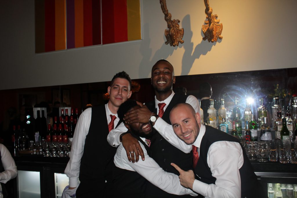the friendly team of Ham Yard Hotel staff busy behind the Dive Bar, making us the best cocktails all night for the Amara Interior Blog Awards 2015.
