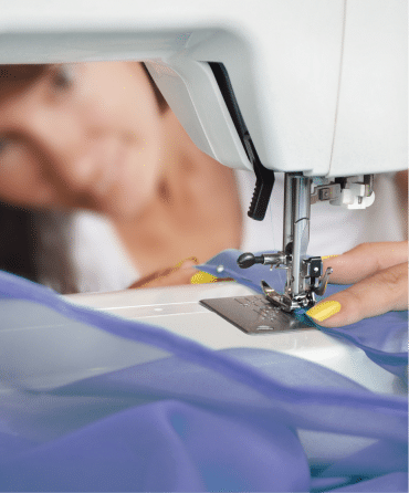 Lady using Sewing Machine