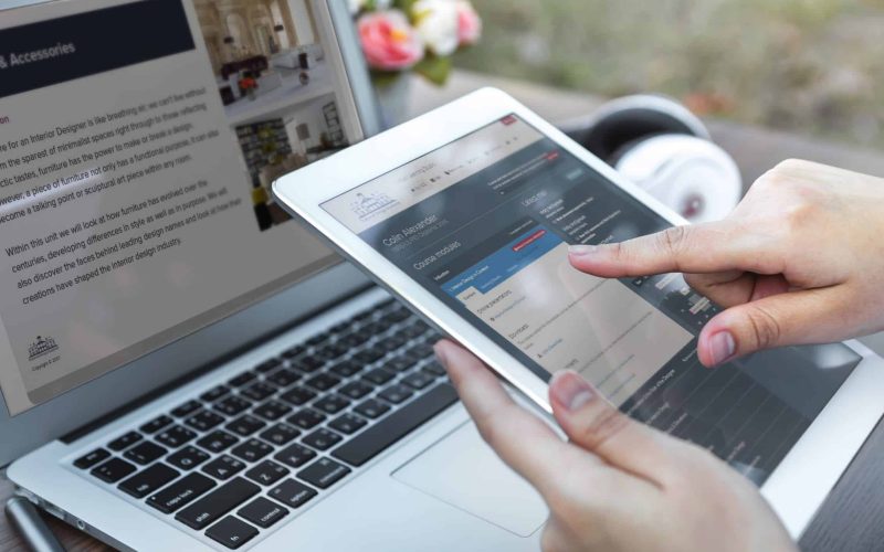 Woman hand hold white tablet with blank empty screen